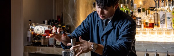 Mixologist Chris making a cocktail in The Maybourne Bar